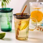 Tasse en verre avec couvercle et paille 450ml